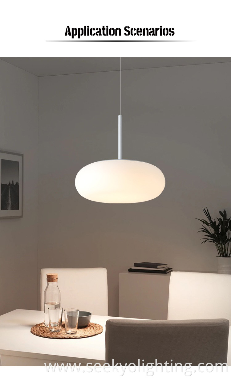 The lamp is made from high-quality acrylic material that mimics the look of smooth, polished pebbles.